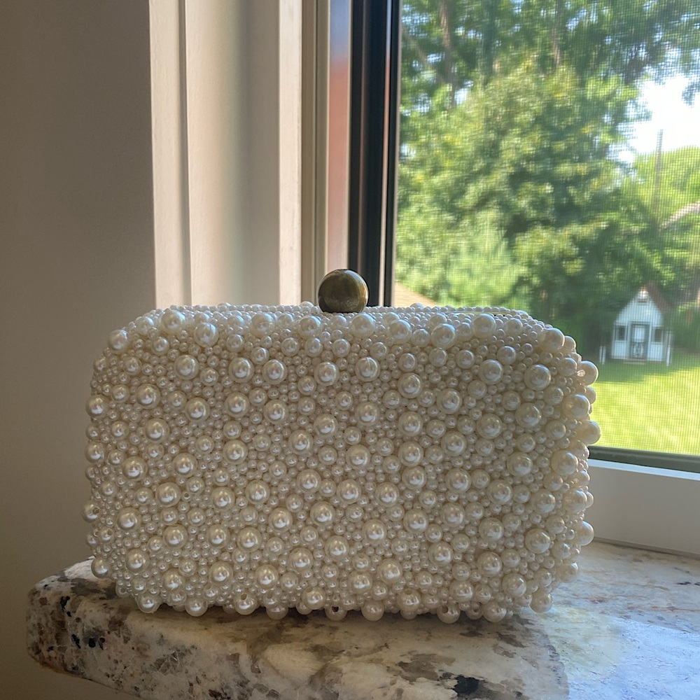 From St Xavier•Pearl Clutch Purse